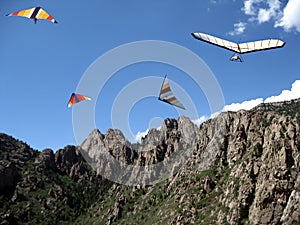 Hang Gliders Circle into the Sunshine w/ Help From a Thermal