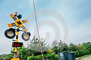 Hangdong Railroad crossing signal railroad barrier at summer in Seoul, Korea