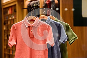 Hanged for presentation multiple colorful polos for sale photo