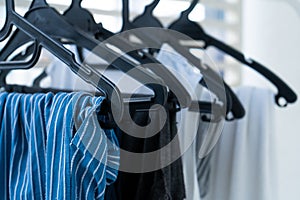 Hangers with clothes drying on the balcony