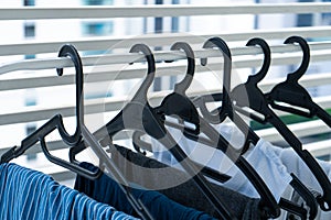 Hangers with clothes drying on the balcony