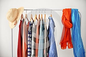 Hangers with different female clothes