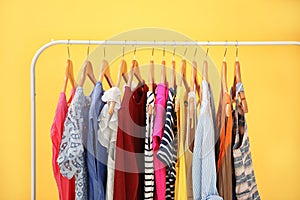 Hangers with different female clothes