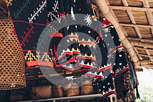 Hanging array of handmade traditional dress of the T`boli women called `Kegal T`boli` photo