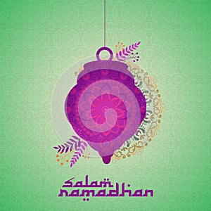 Hanging beautiful lantern on beautiful floral background for welcoming to the Islamic holy month of Ramadan Kareem with