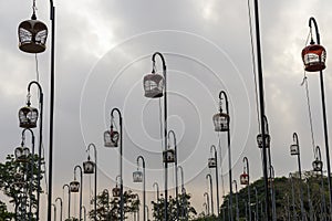 Hanging bird cages at the park