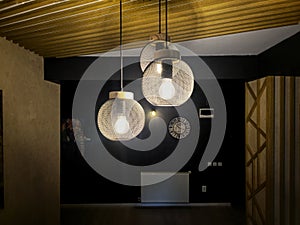 Hanging black globo lighting photo