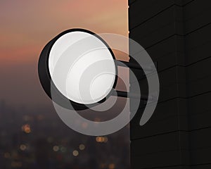 Hanging black rounded signboard mockup over sunset sky