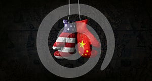 Hanging boxing gloves with the flag of the United Stats of America and the National Flag of the People`s Republic of China