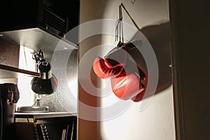 Hanging boxing gloves and lamp