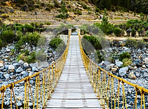 Hanging bridge over Colca river in Chivay, Peru