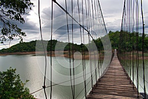 Hanging Bridge over reservoir in Kang Krajarn National Park, Thailand