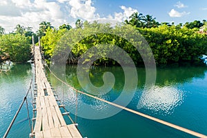 Hanging bridge over Rio Miel river near Baracoa, Cu photo