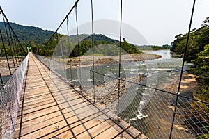 Hanging bridge over river Arajuno