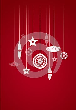 Hanging Christmas decoration on red background.