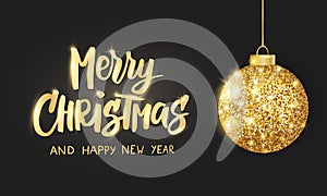 Hanging Christmas golden ball on black background. Sparkling metal glitter bauble. Merry Christmas hand drawn text