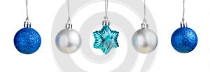 Hanging Christmas and New Year Ornaments against Isolated Background