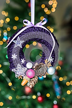 Hanging Christmas Violet wreath with natural ornaments