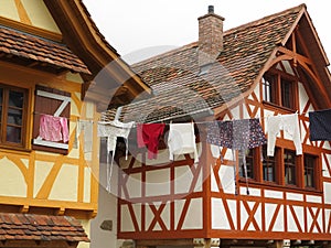 Hanging clothes between houses