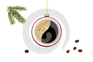 Hanging coffee cup as Christmas ball with flying beans and fir tree branch isolated on white