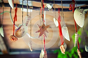 Hanging decorations  from sea seashells and  ceramics for outdoor porch