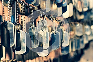 Hanging dog tags without labels