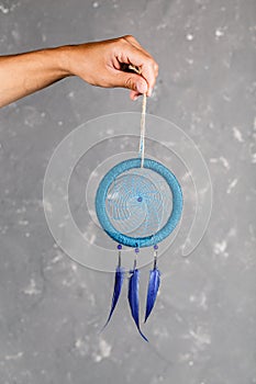 Hanging dream catchers with different colors. Best way to catch bad dreams or nightmares. Best options for bed decoration