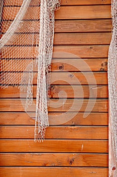 Hanging Fishnet on Wood Wall