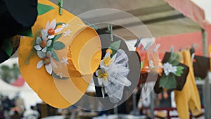 Hanging hats sway with the wind, Adana orange blossom festival