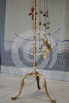 Hanging icon lamp in orthodox church. Orthodox icon lamp. Church attribute. Lamp stand Church