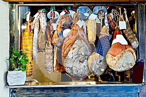 Hanging Italian meats delicacies photo