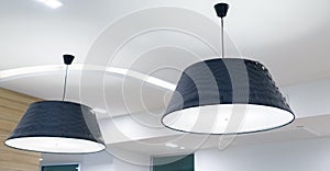 Hanging lamp from ceiling in office