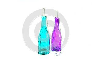 Hanging lamp made of colored a glass bottle.white isolated background