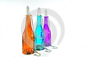 Hanging lamp made of colored a glass bottle.white isolated background