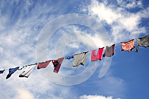 Hanging laundry against beautiful sky