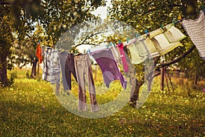 Hanging laundry - color clothes hanging on a clothesline