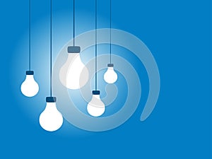 Hanging Light Bulbs on a Blue Background