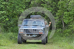 Hanging loose while driving off road in jungle