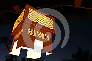 Hanging paper lantern with dark background