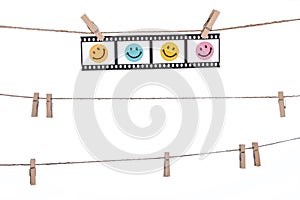 Hanging Photographic Negatives with smiley face, Comedy happy l