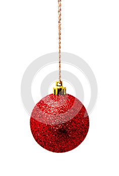 Hanging red christmas ball isolated on a white