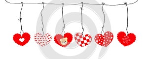 Hanging red nordic hearts Happy Valentine`s day or Merry Christmas greeting card