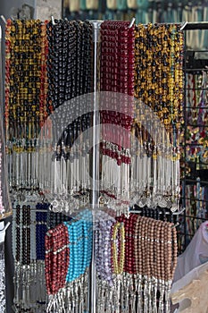 Hanging rosaries in different patterns and colors