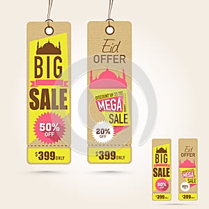 Hanging Sale tags on occasion of Eid Mubarak festival celebration.