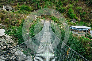 Hanging suspension bridge in himalaya Nepal