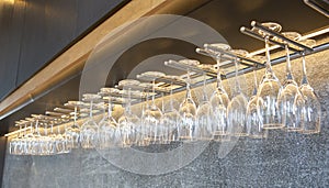 Hanging wine glasses in a hotel bar