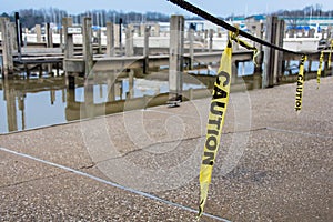 Hanging yellow caution tape strips