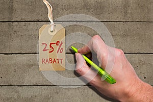 Hangtag with title 25% REBATE in German