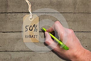 Hangtag with title 50% REBATE in German