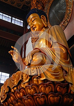 Hangzhou, Zhejiang Province, China:  Buddha statue at Lingyin Temple also known as the Temple of the Soul`s Retreat